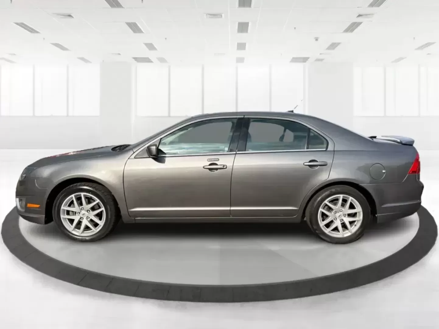 2012 Ford Fusion SEL (3FAHP0JG7CR) with an 3.0L V6 DOHC 24V engine, located at 1099 N County Rd 25A , Troy, OH, 45373, (937) 908-9800, 40.057079, -84.212883 - Need a dependable sedan that can handle the weekday commute to Dayton, quick runs up I75, and comfortable weekend drives through Miami County without draining your budget? This 2012 Ford Fusion SEL is a smart, real-world choice for drivers who want a smooth ride, confident power, and everyday practi - Photo#5