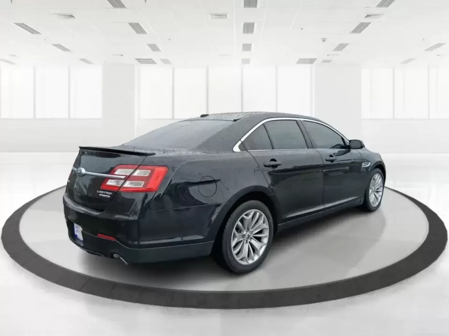 2014 Ford Taurus Limited FWD (1FAHP2F80EG) with an 3.5L V6 DOHC 24V engine, 6-Speed Automatic transmission, located at 8750 N County Rd 25A, Piqua, OH, 45356, (937) 908-9800, 40.164391, -84.232513 - Need a comfortable, confidence-inspiring sedan for a daily commute between Piqua and Dayton, school drop-offs, or weekend getaways up I-75? This 2014 Ford Taurus Limited FWD delivers the kind of quiet, upscale ride that makes long drives feel shorter-while still keeping practicality front and center - Photo#2