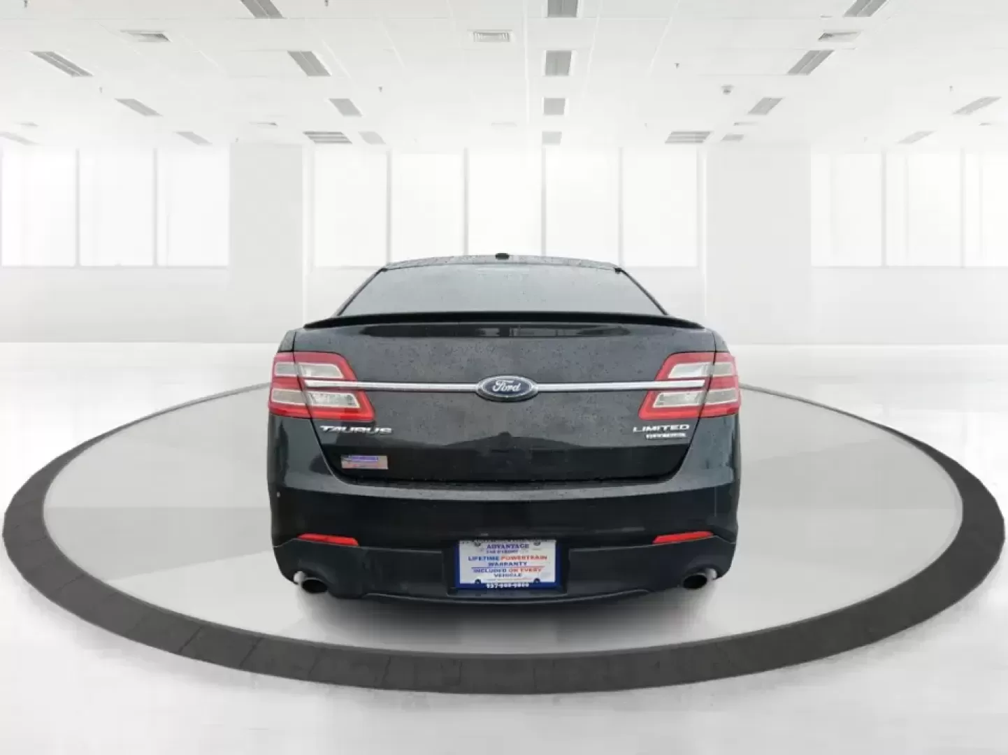 2014 Ford Taurus Limited FWD (1FAHP2F80EG) with an 3.5L V6 DOHC 24V engine, 6-Speed Automatic transmission, located at 8750 N County Rd 25A, Piqua, OH, 45356, (937) 908-9800, 40.164391, -84.232513 - Need a comfortable, confidence-inspiring sedan for a daily commute between Piqua and Dayton, school drop-offs, or weekend getaways up I-75? This 2014 Ford Taurus Limited FWD delivers the kind of quiet, upscale ride that makes long drives feel shorter-while still keeping practicality front and center - Photo#3