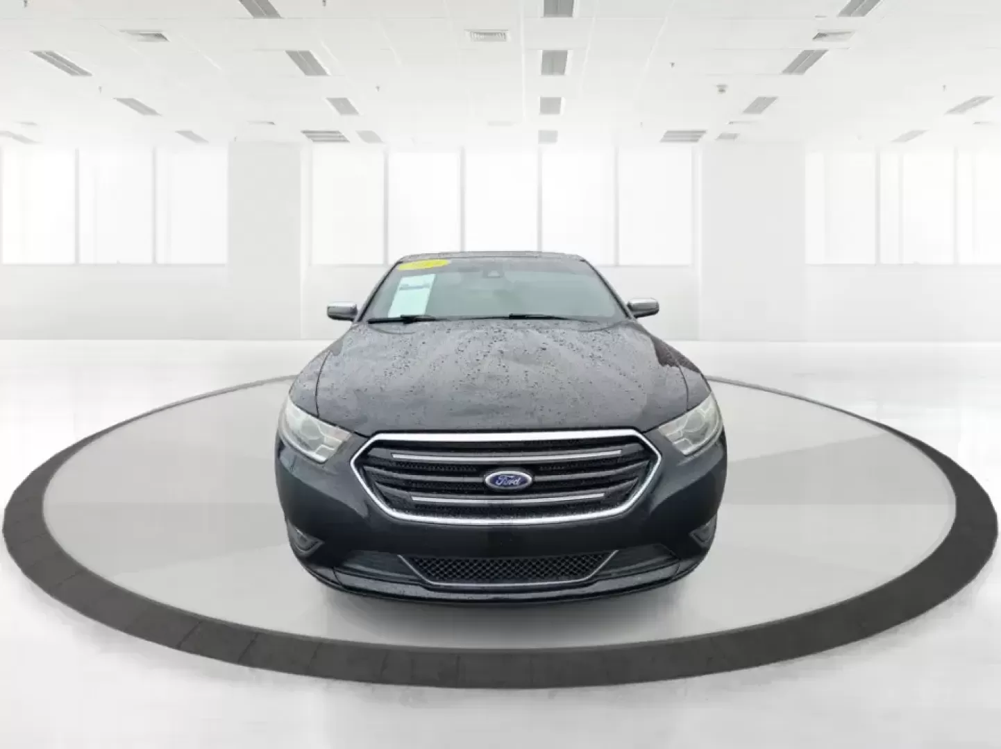 2014 Ford Taurus Limited FWD (1FAHP2F80EG) with an 3.5L V6 DOHC 24V engine, 6-Speed Automatic transmission, located at 8750 N County Rd 25A, Piqua, OH, 45356, (937) 908-9800, 40.164391, -84.232513 - Need a comfortable, confidence-inspiring sedan for a daily commute between Piqua and Dayton, school drop-offs, or weekend getaways up I-75? This 2014 Ford Taurus Limited FWD delivers the kind of quiet, upscale ride that makes long drives feel shorter-while still keeping practicality front and center - Photo#7