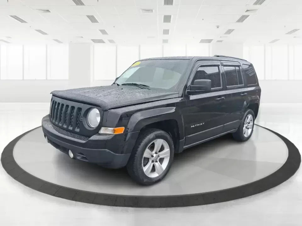 2015 Jeep Patriot Latitude (1C4NJRFB8FD) with an 2.4L I-4 DOHC engine, located at 8750 N County Rd 25A, Piqua, OH, 45356, (937) 908-9800, 40.164391, -84.232513 - Weekend escapes, snowy school runs, and daily commutes down I75 all get easier when you've got an SUV that's ready for Ohio weather and real-life schedules. This **2015 Jeep Patriot Latitude 4WD** is a practical choice for drivers who want the Jeep look and capability without the oversized footprint - Photo#8