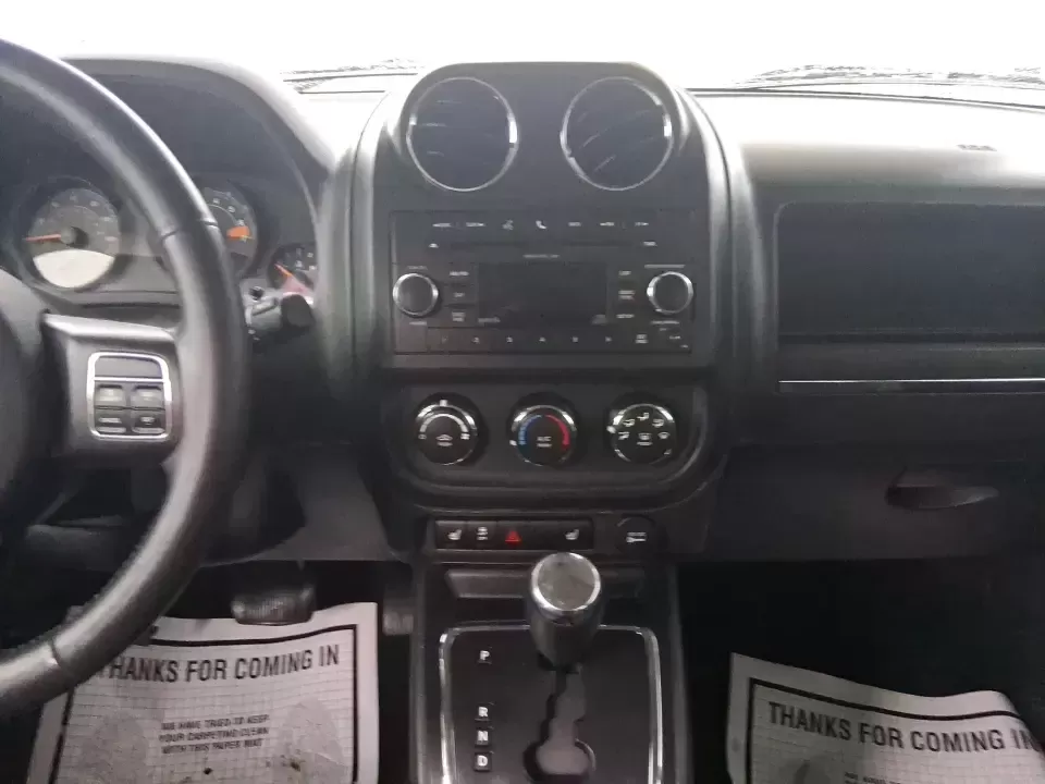 2015 Jeep Patriot Latitude (1C4NJRFB8FD) with an 2.4L I-4 DOHC engine, located at 8750 N County Rd 25A, Piqua, OH, 45356, (937) 908-9800, 40.164391, -84.232513 - Weekend escapes, snowy school runs, and daily commutes down I75 all get easier when you've got an SUV that's ready for Ohio weather and real-life schedules. This **2015 Jeep Patriot Latitude 4WD** is a practical choice for drivers who want the Jeep look and capability without the oversized footprint - Photo#13