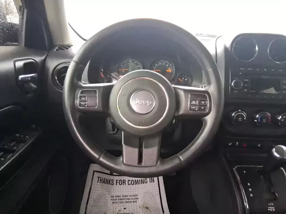 2015 Jeep Patriot Latitude (1C4NJRFB8FD) with an 2.4L I-4 DOHC engine, located at 8750 N County Rd 25A, Piqua, OH, 45356, (937) 908-9800, 40.164391, -84.232513 - Weekend escapes, snowy school runs, and daily commutes down I75 all get easier when you've got an SUV that's ready for Ohio weather and real-life schedules. This **2015 Jeep Patriot Latitude 4WD** is a practical choice for drivers who want the Jeep look and capability without the oversized footprint - Photo#16