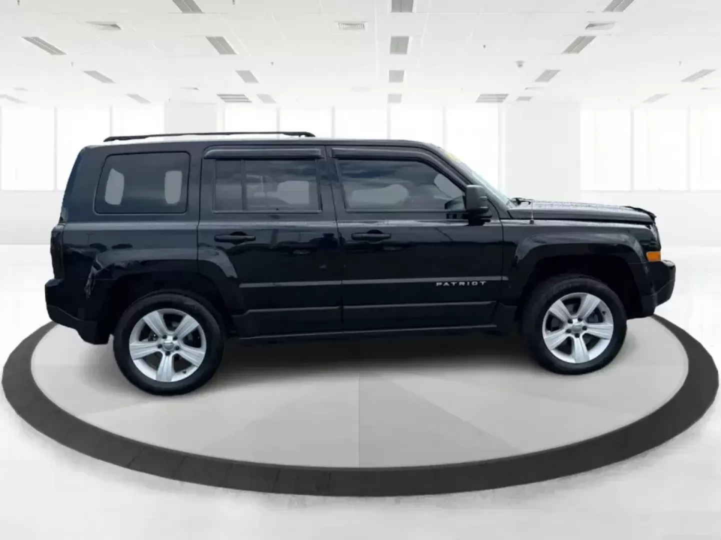 2015 Jeep Patriot Latitude 4WD (1C4NJRFB8FD) with an 2.4L L4 DOHC 16V engine, located at 401 Woodman Dr, Riverside, OH, 45431, (937) 908-9800, 39.760899, -84.123421 - Weekend getaways, snowy commutes, and everyday errands feel a lot easier when you've got an SUV that's ready for whatever Ohio throws your way. This **2015 Jeep Patriot Latitude 4WD** is a practical choice for drivers who want confident traction, versatile cargo space, and a comfortable cabin for fi- Photo#1