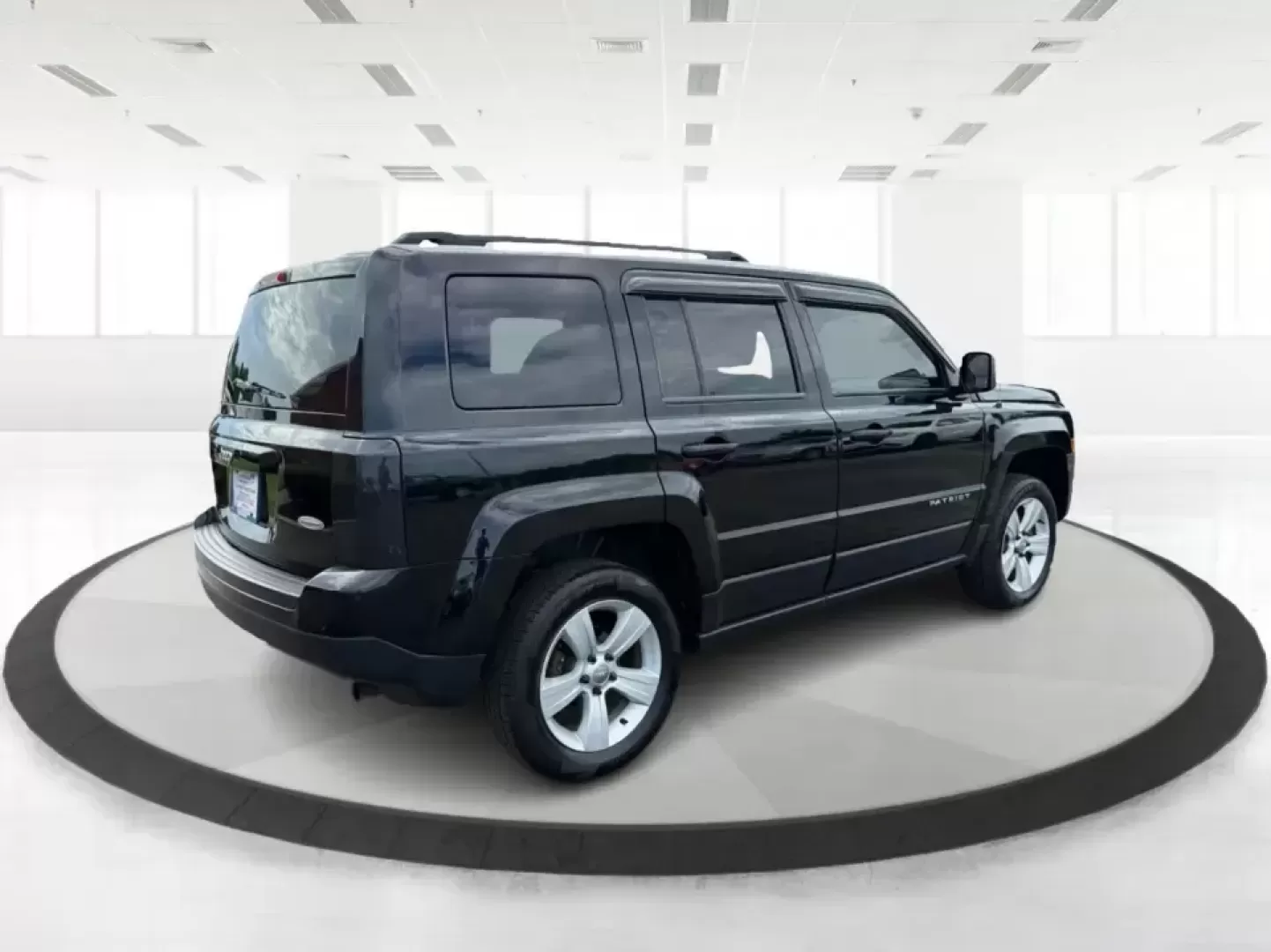 2015 Jeep Patriot Latitude 4WD (1C4NJRFB8FD) with an 2.4L L4 DOHC 16V engine, located at 401 Woodman Dr, Riverside, OH, 45431, (937) 908-9800, 39.760899, -84.123421 - Weekend getaways, snowy commutes, and everyday errands feel a lot easier when you've got an SUV that's ready for whatever Ohio throws your way. This **2015 Jeep Patriot Latitude 4WD** is a practical choice for drivers who want confident traction, versatile cargo space, and a comfortable cabin for fi- Photo#2