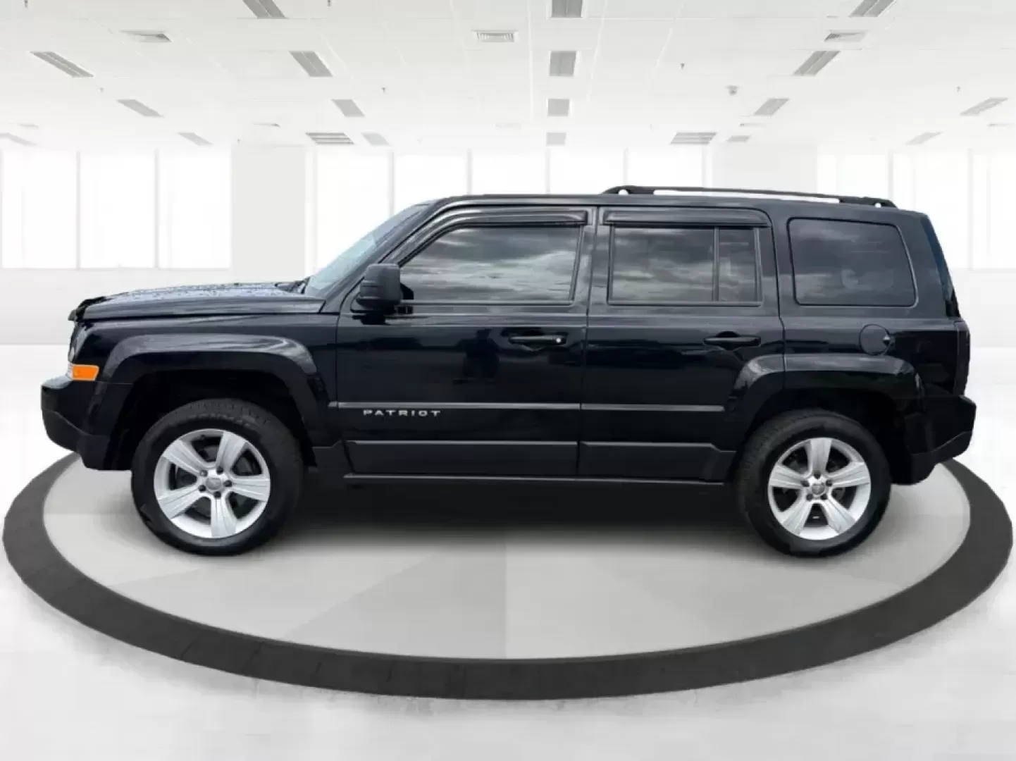 2015 Jeep Patriot Latitude 4WD (1C4NJRFB8FD) with an 2.4L L4 DOHC 16V engine, located at 401 Woodman Dr, Riverside, OH, 45431, (937) 908-9800, 39.760899, -84.123421 - Weekend getaways, snowy commutes, and everyday errands feel a lot easier when you've got an SUV that's ready for whatever Ohio throws your way. This **2015 Jeep Patriot Latitude 4WD** is a practical choice for drivers who want confident traction, versatile cargo space, and a comfortable cabin for fi- Photo#5
