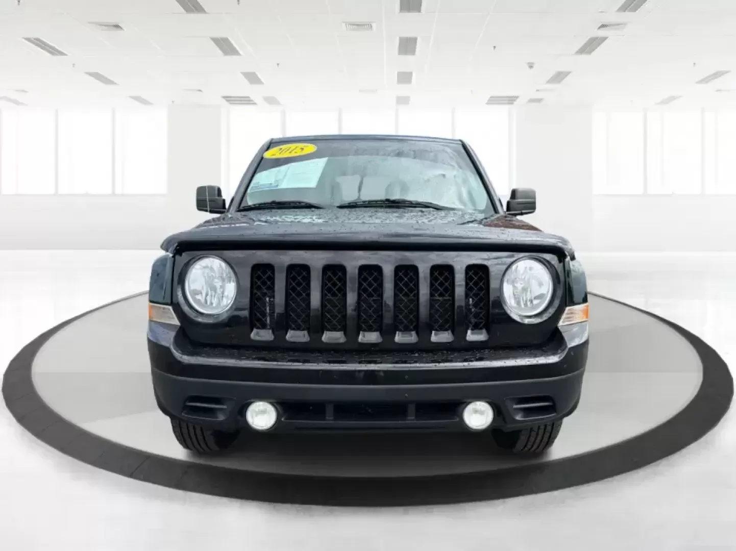 2015 Jeep Patriot Latitude 4WD (1C4NJRFB8FD) with an 2.4L L4 DOHC 16V engine, located at 401 Woodman Dr, Riverside, OH, 45431, (937) 908-9800, 39.760899, -84.123421 - Weekend getaways, snowy commutes, and everyday errands feel a lot easier when you've got an SUV that's ready for whatever Ohio throws your way. This **2015 Jeep Patriot Latitude 4WD** is a practical choice for drivers who want confident traction, versatile cargo space, and a comfortable cabin for fi- Photo#7
