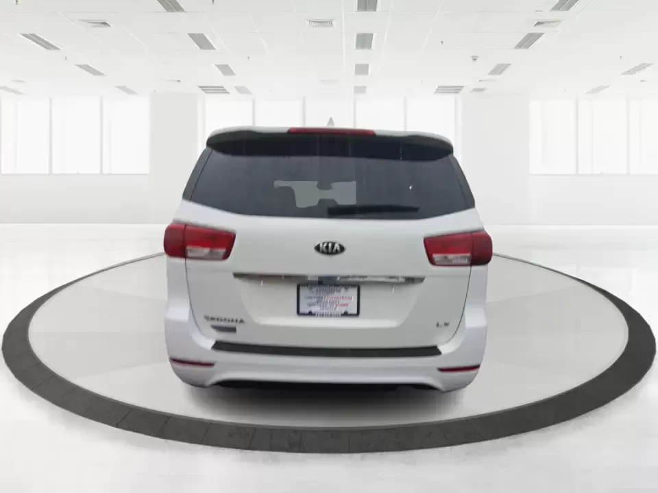 2016 Kia Sedona LX (KNDMB5C11G6) with an Lambda 3.3L V-6 gasoline direct injection engine, 6-Speed Automatic transmission, located at 401 Woodman Dr, Riverside, OH, 45431, (937) 908-9800, 39.760899, -84.123421 - Picture your next weekend: the kids piled in with snacks and sports gear, a cooler in the back, and enough space so everyone can stretch out on the drive down South Dixie Dr toward Dayton's parks, festivals, and family attractions. If you need a dependable, budget-smart people mover that keeps daily - Photo#2