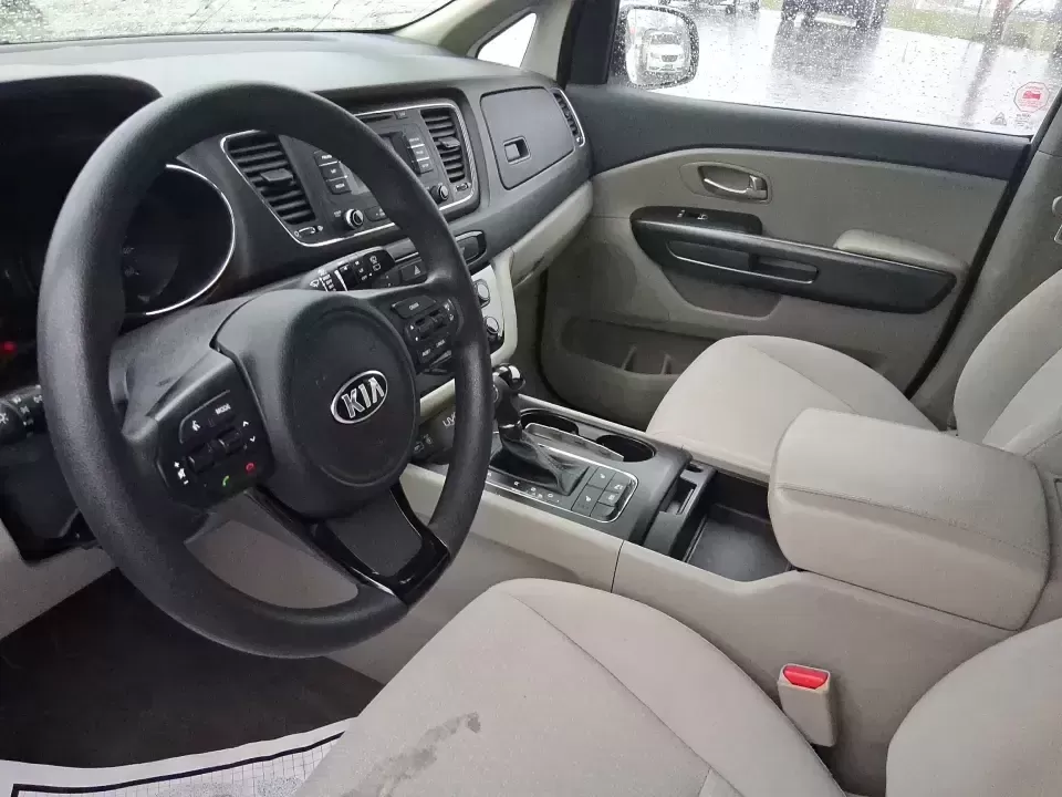2016 Kia Sedona LX (KNDMB5C11G6) with an Lambda 3.3L V-6 gasoline direct injection engine, 6-Speed Automatic transmission, located at 401 Woodman Dr, Riverside, OH, 45431, (937) 908-9800, 39.760899, -84.123421 - Picture your next weekend: the kids piled in with snacks and sports gear, a cooler in the back, and enough space so everyone can stretch out on the drive down South Dixie Dr toward Dayton's parks, festivals, and family attractions. If you need a dependable, budget-smart people mover that keeps daily - Photo#5