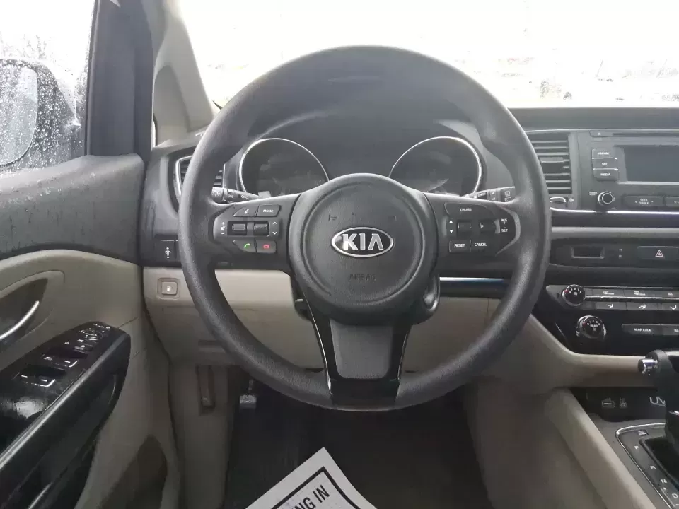 2016 Kia Sedona LX (KNDMB5C11G6) with an Lambda 3.3L V-6 gasoline direct injection engine, 6-Speed Automatic transmission, located at 401 Woodman Dr, Riverside, OH, 45431, (937) 908-9800, 39.760899, -84.123421 - Picture your next weekend: the kids piled in with snacks and sports gear, a cooler in the back, and enough space so everyone can stretch out on the drive down South Dixie Dr toward Dayton's parks, festivals, and family attractions. If you need a dependable, budget-smart people mover that keeps daily - Photo#13