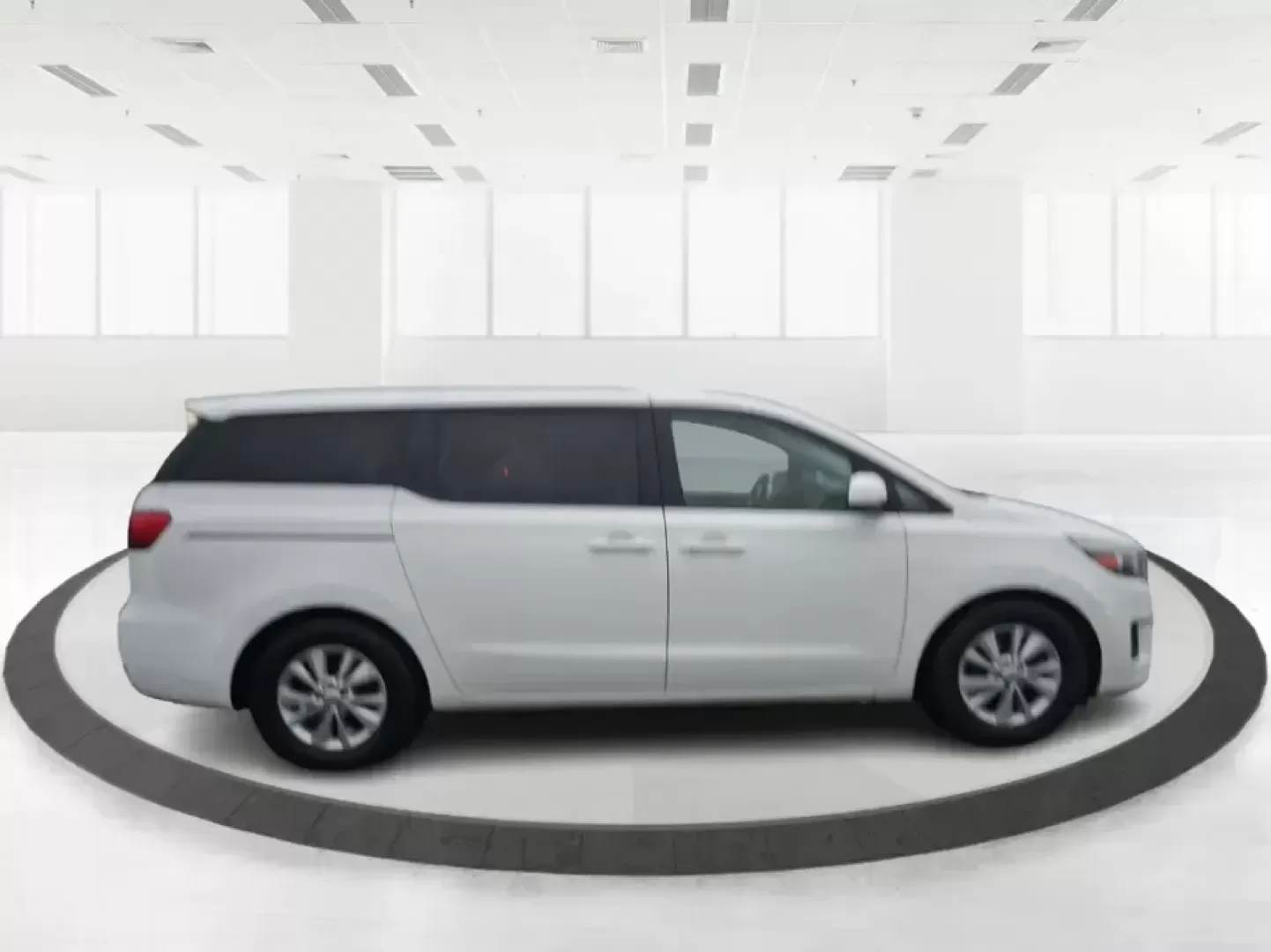 2016 Kia Sedona LX (KNDMB5C11G6) with an Lambda 3.3L V-6 gasoline direct injection engine, 6-Speed Automatic transmission, located at 880 E. National Road, Vandalia, OH, 45377, (937) 908-9800, 39.891918, -84.183594 - Picture your next weekend: the kids piled in with snacks and sports gear, a cooler in the back, and enough space so everyone can stretch out on the drive down South Dixie Dr toward Dayton's parks, festivals, and family attractions. If you need a dependable, budget-smart people mover that keeps daily - Photo#1