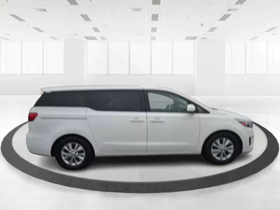 2016 Kia Sedona LX (KNDMB5C11G6) with an Lambda 3.3L V-6 gasoline direct injection engine, 6-Speed Automatic transmission, located at 880 E. National Road, Vandalia, OH, 45377, (937) 908-9800, 39.891918, -84.183594 - Picture your next weekend: the kids piled in with snacks and sports gear, a cooler in the back, and enough space so everyone can stretch out on the drive down South Dixie Dr toward Dayton's parks, festivals, and family attractions. If you need a dependable, budget-smart people mover that keeps daily - Photo#1