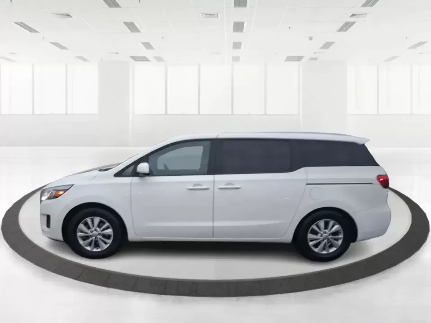2016 Kia Sedona LX (KNDMB5C11G6) with an Lambda 3.3L V-6 gasoline direct injection engine, 6-Speed Automatic transmission, located at 880 E. National Road, Vandalia, OH, 45377, (937) 908-9800, 39.891918, -84.183594 - Picture your next weekend: the kids piled in with snacks and sports gear, a cooler in the back, and enough space so everyone can stretch out on the drive down South Dixie Dr toward Dayton's parks, festivals, and family attractions. If you need a dependable, budget-smart people mover that keeps daily - Photo#3