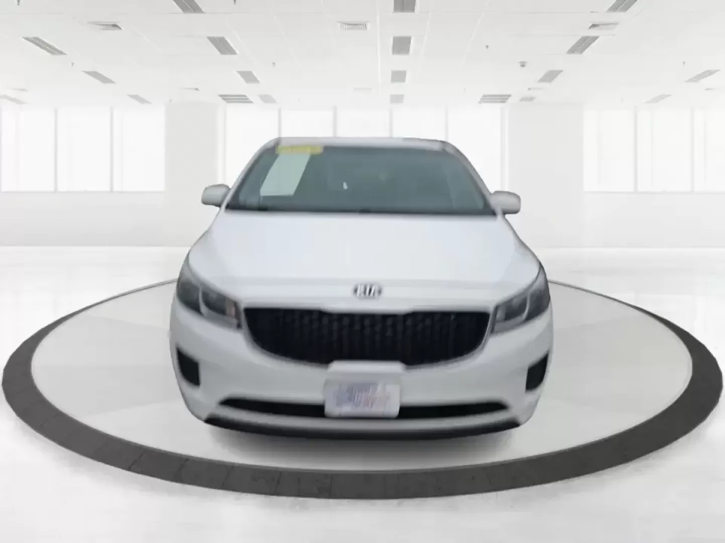 2016 Kia Sedona LX (KNDMB5C11G6) with an Lambda 3.3L V-6 gasoline direct injection engine, 6-Speed Automatic transmission, located at 880 E. National Road, Vandalia, OH, 45377, (937) 908-9800, 39.891918, -84.183594 - Picture your next weekend: the kids piled in with snacks and sports gear, a cooler in the back, and enough space so everyone can stretch out on the drive down South Dixie Dr toward Dayton's parks, festivals, and family attractions. If you need a dependable, budget-smart people mover that keeps daily - Photo#4