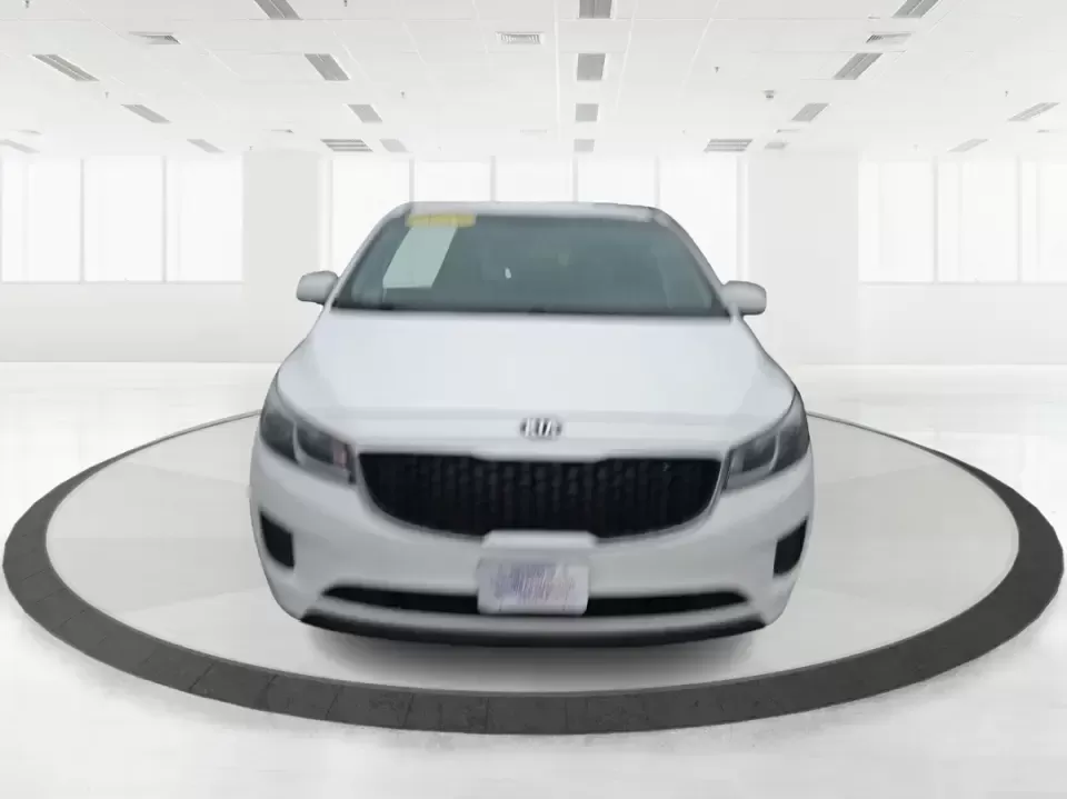 2016 Kia Sedona LX (KNDMB5C11G6) with an Lambda 3.3L V-6 gasoline direct injection engine, 6-Speed Automatic transmission, located at 880 E. National Road, Vandalia, OH, 45377, (937) 908-9800, 39.891918, -84.183594 - Picture your next weekend: the kids piled in with snacks and sports gear, a cooler in the back, and enough space so everyone can stretch out on the drive down South Dixie Dr toward Dayton's parks, festivals, and family attractions. If you need a dependable, budget-smart people mover that keeps daily - Photo#4