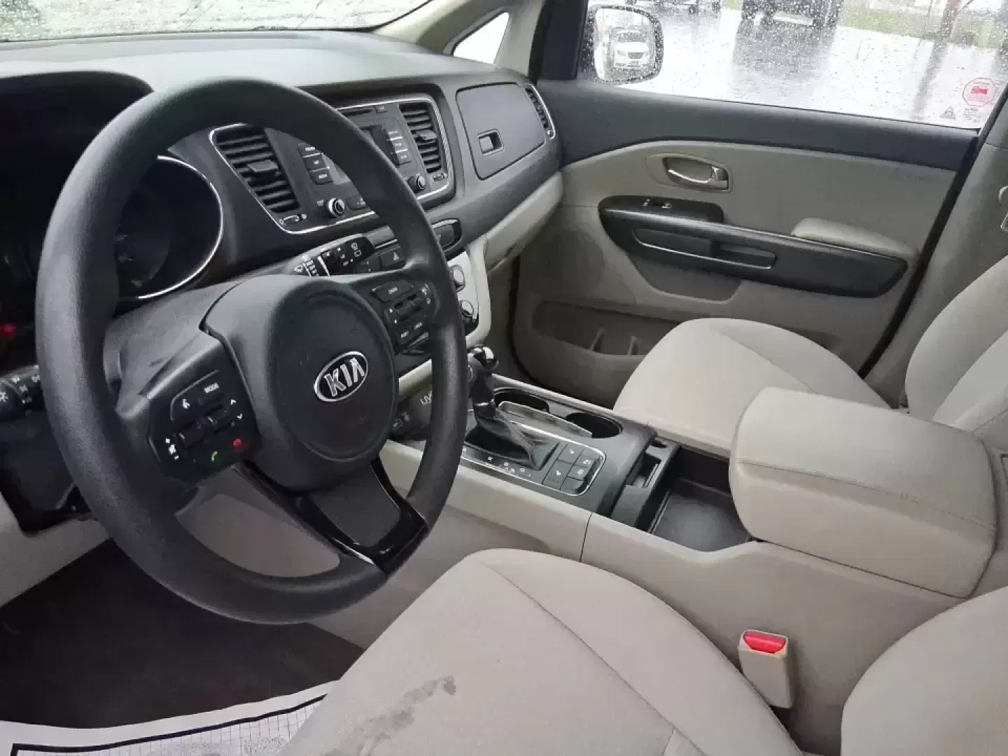 2016 Kia Sedona LX (KNDMB5C11G6) with an Lambda 3.3L V-6 gasoline direct injection engine, 6-Speed Automatic transmission, located at 880 E. National Road, Vandalia, OH, 45377, (937) 908-9800, 39.891918, -84.183594 - Picture your next weekend: the kids piled in with snacks and sports gear, a cooler in the back, and enough space so everyone can stretch out on the drive down South Dixie Dr toward Dayton's parks, festivals, and family attractions. If you need a dependable, budget-smart people mover that keeps daily - Photo#5