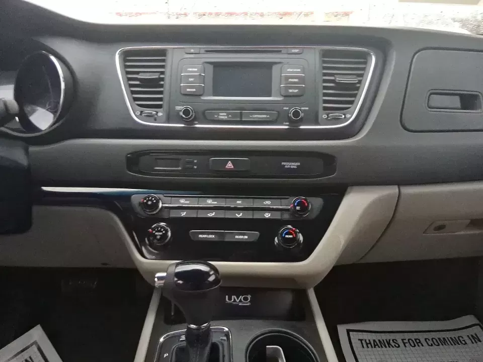 2016 Kia Sedona LX (KNDMB5C11G6) with an Lambda 3.3L V-6 gasoline direct injection engine, 6-Speed Automatic transmission, located at 880 E. National Road, Vandalia, OH, 45377, (937) 908-9800, 39.891918, -84.183594 - Picture your next weekend: the kids piled in with snacks and sports gear, a cooler in the back, and enough space so everyone can stretch out on the drive down South Dixie Dr toward Dayton's parks, festivals, and family attractions. If you need a dependable, budget-smart people mover that keeps daily - Photo#10