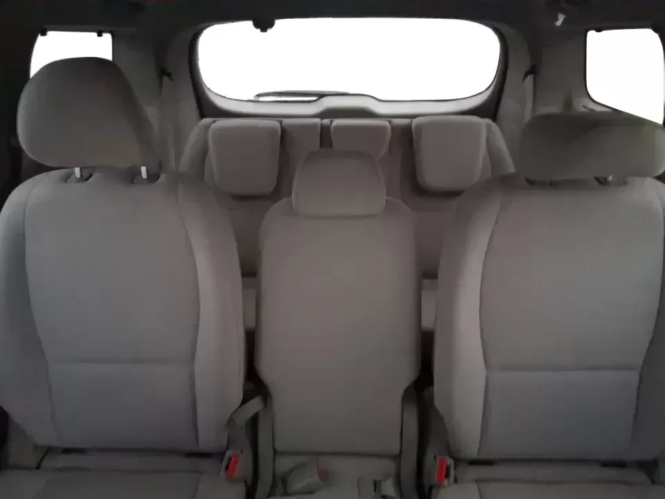 2016 Kia Sedona LX (KNDMB5C11G6) with an Lambda 3.3L V-6 gasoline direct injection engine, 6-Speed Automatic transmission, located at 880 E. National Road, Vandalia, OH, 45377, (937) 908-9800, 39.891918, -84.183594 - Picture your next weekend: the kids piled in with snacks and sports gear, a cooler in the back, and enough space so everyone can stretch out on the drive down South Dixie Dr toward Dayton's parks, festivals, and family attractions. If you need a dependable, budget-smart people mover that keeps daily - Photo#11