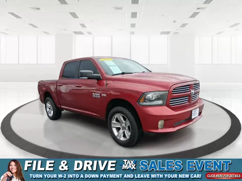 2014 Ram 1500 Sport (1C6RR7MT6ES) with an HEMI 5.7L V-8 variable valve control engine, 6-Speed Automatic transmission, located at 401 Woodman Dr, Riverside, OH, 45431, (937) 908-9800, 39.760899, -84.123421 - Need a truck that can handle weekday work, weekend getaways, and everything Ohio weather throws at you? This Flame Red Clearcoat 2014 Ram 1500 Sport Crew Cab 4WD is built for real life-hauling project supplies to a home in Riverside, towing toys for a day near Eastwood MetroPark, or loading up the f - Photo#0