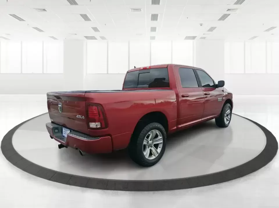 2014 Ram 1500 Sport (1C6RR7MT6ES) with an HEMI 5.7L V-8 variable valve control engine, 6-Speed Automatic transmission, located at 401 Woodman Dr, Riverside, OH, 45431, (937) 908-9800, 39.760899, -84.123421 - Need a truck that can handle weekday work, weekend getaways, and everything Ohio weather throws at you? This Flame Red Clearcoat 2014 Ram 1500 Sport Crew Cab 4WD is built for real life-hauling project supplies to a home in Riverside, towing toys for a day near Eastwood MetroPark, or loading up the f - Photo#2