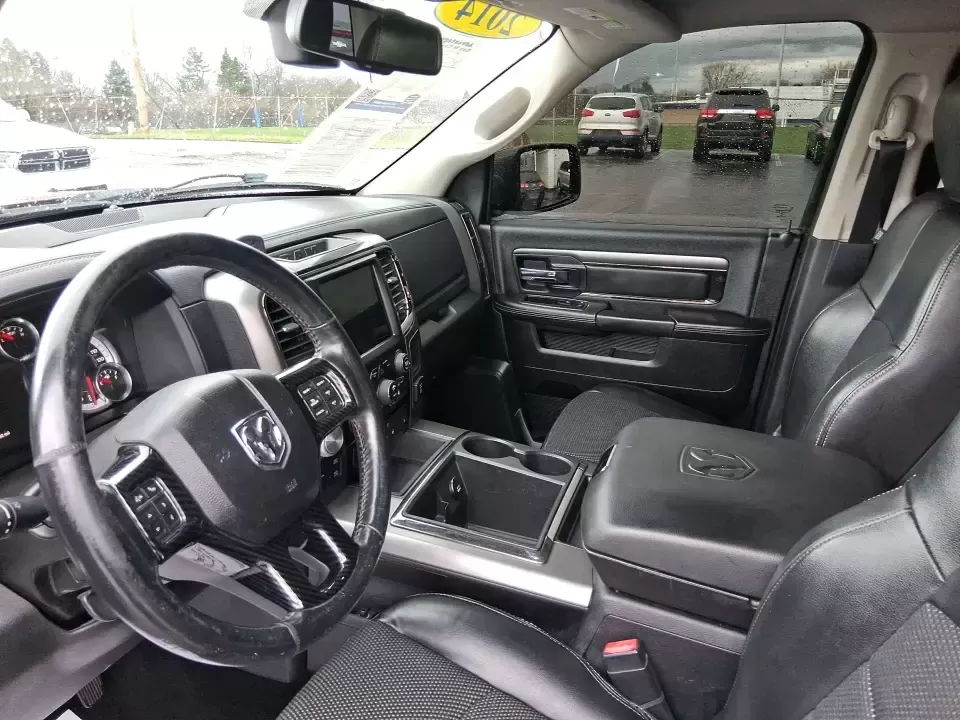 2014 Ram 1500 Sport (1C6RR7MT6ES) with an HEMI 5.7L V-8 variable valve control engine, 6-Speed Automatic transmission, located at 401 Woodman Dr, Riverside, OH, 45431, (937) 908-9800, 39.760899, -84.123421 - Need a truck that can handle weekday work, weekend getaways, and everything Ohio weather throws at you? This Flame Red Clearcoat 2014 Ram 1500 Sport Crew Cab 4WD is built for real life-hauling project supplies to a home in Riverside, towing toys for a day near Eastwood MetroPark, or loading up the f - Photo#9