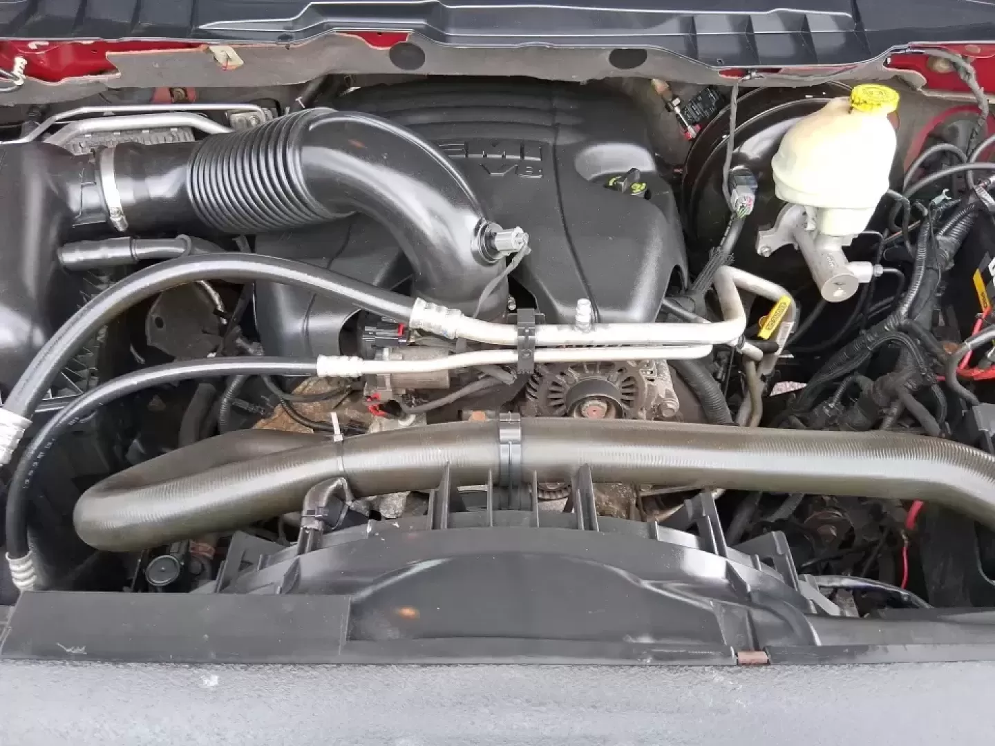 2014 Ram 1500 Sport (1C6RR7MT6ES) with an HEMI 5.7L V-8 variable valve control engine, 6-Speed Automatic transmission, located at 401 Woodman Dr, Riverside, OH, 45431, (937) 908-9800, 39.760899, -84.123421 - Need a truck that can handle weekday work, weekend getaways, and everything Ohio weather throws at you? This Flame Red Clearcoat 2014 Ram 1500 Sport Crew Cab 4WD is built for real life-hauling project supplies to a home in Riverside, towing toys for a day near Eastwood MetroPark, or loading up the f - Photo#11