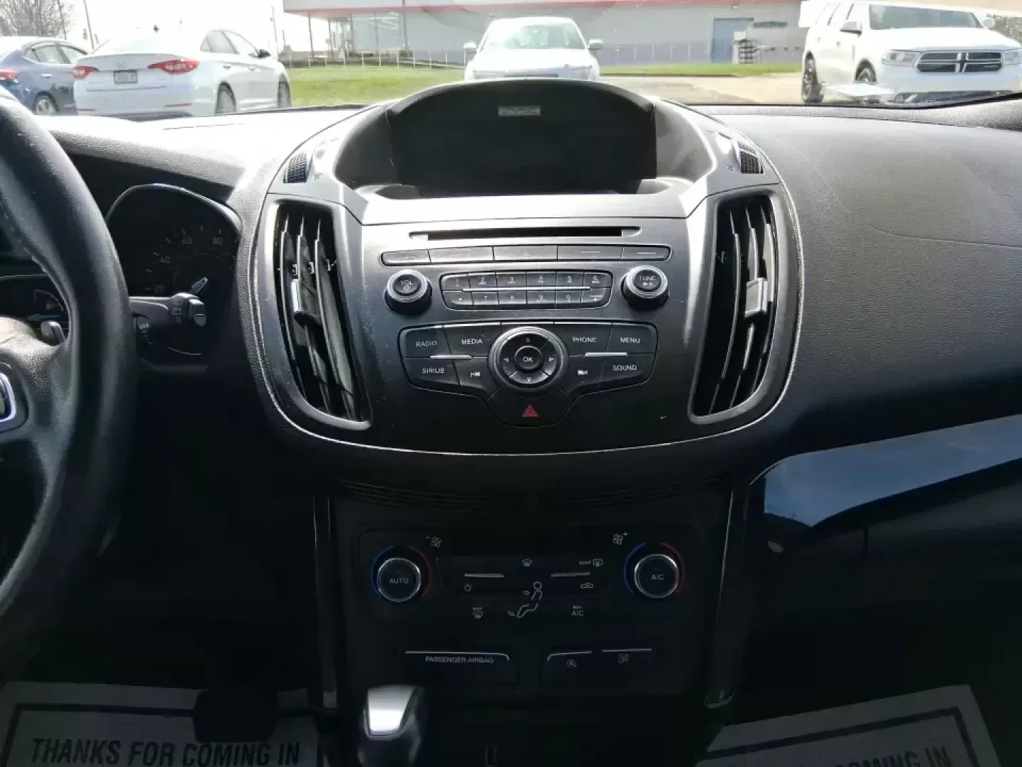 2017 Ford Escape SE (1FMCU9GD2HU) with an 1.5L L4 DOHC 16V engine, 6A transmission, located at 880 E. National Road, Vandalia, OH, 45377, (937) 908-9800, 39.891918, -84.183594 - Make every day easier-whether you're tackling a long commute up I-75, shuttling kids between school and practice, or packing up for a weekend escape to the Dayton area parks. This 2017 Ford Escape SE in Magnetic Metallic is the kind of compact SUV that fits real life in Vandalia, OH: easy to park, c - Photo#12