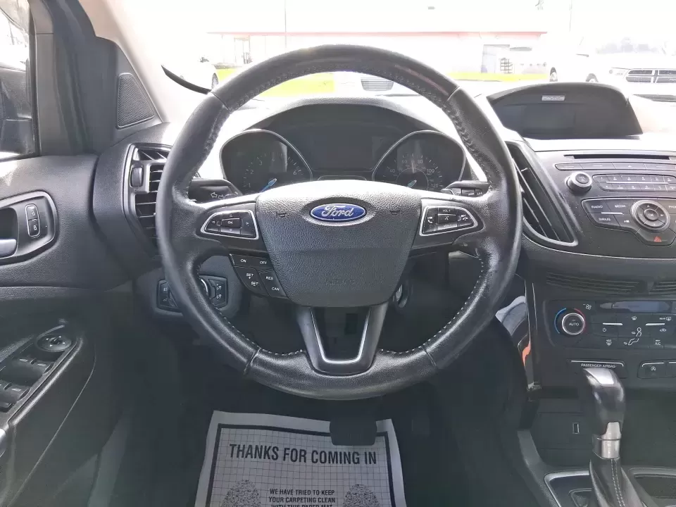 2017 Ford Escape SE (1FMCU9GD2HU) with an 1.5L L4 DOHC 16V engine, 6A transmission, located at 880 E. National Road, Vandalia, OH, 45377, (937) 908-9800, 39.891918, -84.183594 - Make every day easier-whether you're tackling a long commute up I-75, shuttling kids between school and practice, or packing up for a weekend escape to the Dayton area parks. This 2017 Ford Escape SE in Magnetic Metallic is the kind of compact SUV that fits real life in Vandalia, OH: easy to park, c - Photo#15