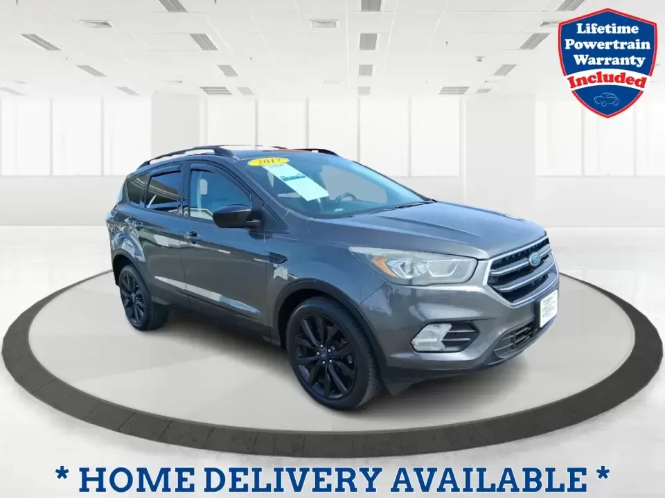 2017 Ford Escape SE (1FMCU9GD2HU) with an 1.5L L4 DOHC 16V engine, 6A transmission, located at 880 E. National Road, Vandalia, OH, 45377, (937) 908-9800, 39.891918, -84.183594 - Make every day easier-whether you're tackling a long commute up I-75, shuttling kids between school and practice, or packing up for a weekend escape to the Dayton area parks. This 2017 Ford Escape SE in Magnetic Metallic is the kind of compact SUV that fits real life in Vandalia, OH: easy to park, c - Photo#0