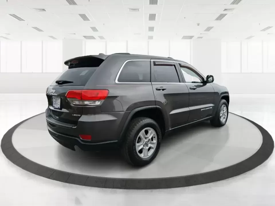 2015 Jeep Grand Cherokee Laredo (1C4RJFAG5FC) with an 3.6L V-6 DOHC engine, 8-Speed Automatic transmission, located at 1099 N County Rd 25A , Troy, OH, 45373, (937) 908-9800, 40.057079, -84.212883 - Need one SUV that can handle school drop-offs in the morning, a smooth I75 commute at lunchtime, and a last-minute weekend escape to the Miami Valley trails? This 2015 Jeep Grand Cherokee Laredo 4WD is built for real life in Troy, Ohio-comfortable enough for daily driving, confident enough for unpre - Photo#2