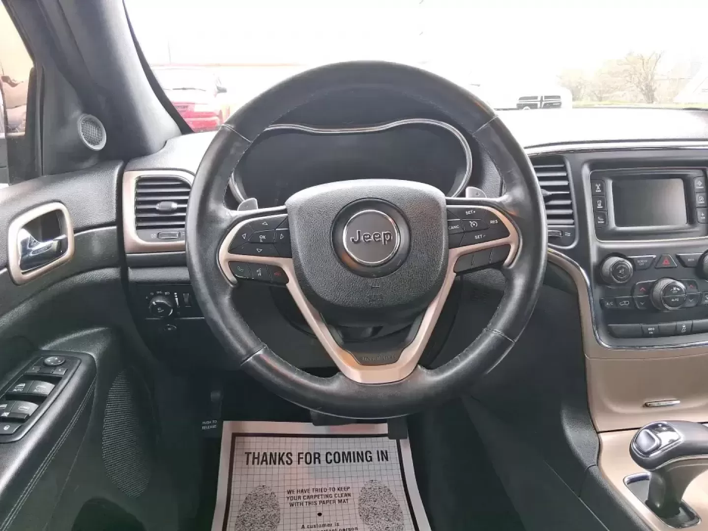 2015 Jeep Grand Cherokee Laredo (1C4RJFAG5FC) with an 3.6L V-6 DOHC engine, 8-Speed Automatic transmission, located at 1951 S Dayton Lakeview Rd., New Carlisle, OH, 45344, (937) 908-9800, 39.890999, -84.050255 - Need one SUV that can handle school drop-offs in the morning, a smooth I75 commute at lunchtime, and a last-minute weekend escape to the Miami Valley trails? This 2015 Jeep Grand Cherokee Laredo 4WD is built for real life in Troy, Ohio-comfortable enough for daily driving, confident enough for unpre - Photo#16