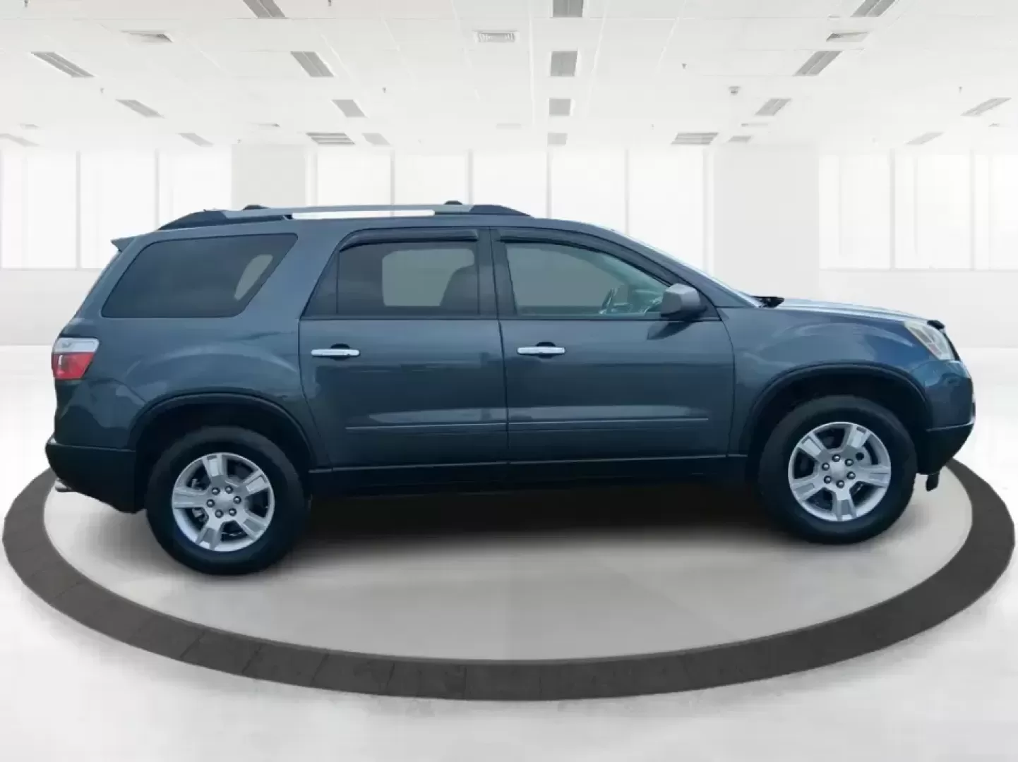 2012 GMC Acadia SL (1GKKRNED6CJ) with an 3.6L V-6 gasoline direct injection engine, 6-Speed Automatic transmission, located at 8750 N County Rd 25A, Piqua, OH, 45356, (937) 908-9800, 40.164391, -84.232513 - Pack up the kids, load the cooler, and point the SUV toward your next weekend getaway-this 2012 GMC Acadia SL is built for real-life Ohio driving, from school drop-offs and long commutes to road trips up I-75 and errands around Piqua. With three-row versatility, confident road manners, and family-fr - Photo#1
