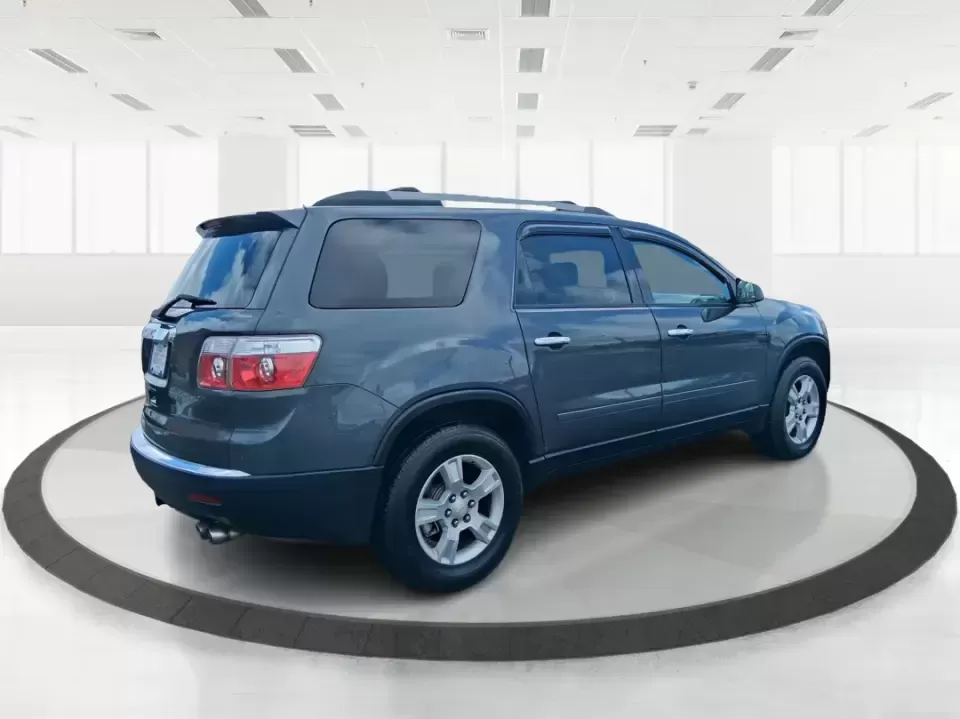 2012 GMC Acadia SL (1GKKRNED6CJ) with an 3.6L V-6 gasoline direct injection engine, 6-Speed Automatic transmission, located at 8750 N County Rd 25A, Piqua, OH, 45356, (937) 908-9800, 40.164391, -84.232513 - Pack up the kids, load the cooler, and point the SUV toward your next weekend getaway-this 2012 GMC Acadia SL is built for real-life Ohio driving, from school drop-offs and long commutes to road trips up I-75 and errands around Piqua. With three-row versatility, confident road manners, and family-fr - Photo#2