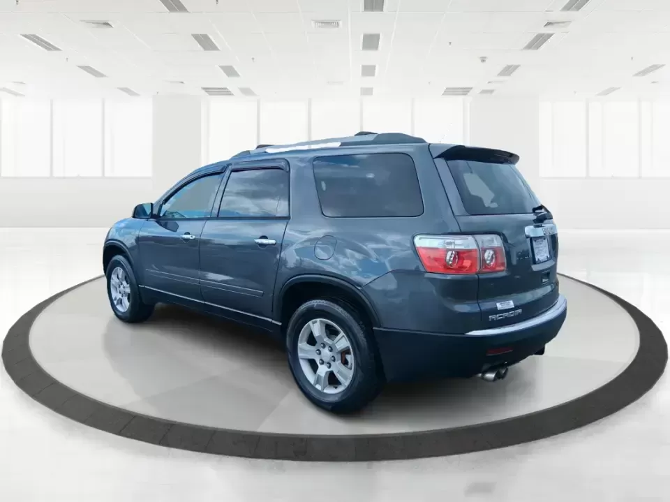 2012 GMC Acadia SL (1GKKRNED6CJ) with an 3.6L V-6 gasoline direct injection engine, 6-Speed Automatic transmission, located at 8750 N County Rd 25A, Piqua, OH, 45356, (937) 908-9800, 40.164391, -84.232513 - Pack up the kids, load the cooler, and point the SUV toward your next weekend getaway-this 2012 GMC Acadia SL is built for real-life Ohio driving, from school drop-offs and long commutes to road trips up I-75 and errands around Piqua. With three-row versatility, confident road manners, and family-fr - Photo#4