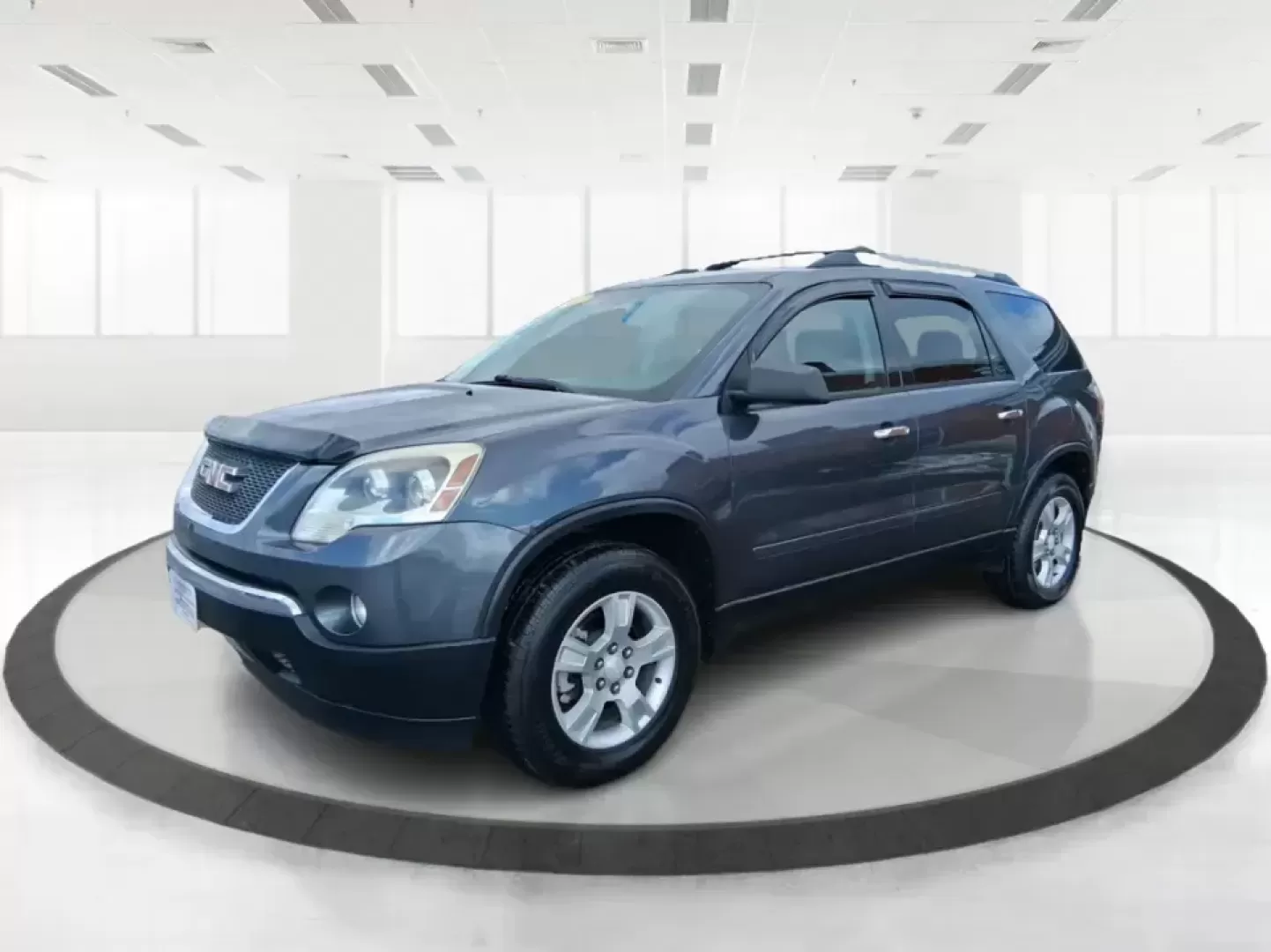 2012 GMC Acadia SL (1GKKRNED6CJ) with an 3.6L V-6 gasoline direct injection engine, 6-Speed Automatic transmission, located at 8750 N County Rd 25A, Piqua, OH, 45356, (937) 908-9800, 40.164391, -84.232513 - Pack up the kids, load the cooler, and point the SUV toward your next weekend getaway-this 2012 GMC Acadia SL is built for real-life Ohio driving, from school drop-offs and long commutes to road trips up I-75 and errands around Piqua. With three-row versatility, confident road manners, and family-fr - Photo#8