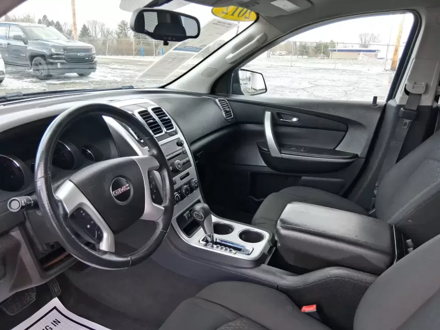 2012 GMC Acadia SL (1GKKRNED6CJ) with an 3.6L V-6 gasoline direct injection engine, 6-Speed Automatic transmission, located at 8750 N County Rd 25A, Piqua, OH, 45356, (937) 908-9800, 40.164391, -84.232513 - Pack up the kids, load the cooler, and point the SUV toward your next weekend getaway-this 2012 GMC Acadia SL is built for real-life Ohio driving, from school drop-offs and long commutes to road trips up I-75 and errands around Piqua. With three-row versatility, confident road manners, and family-fr - Photo#9