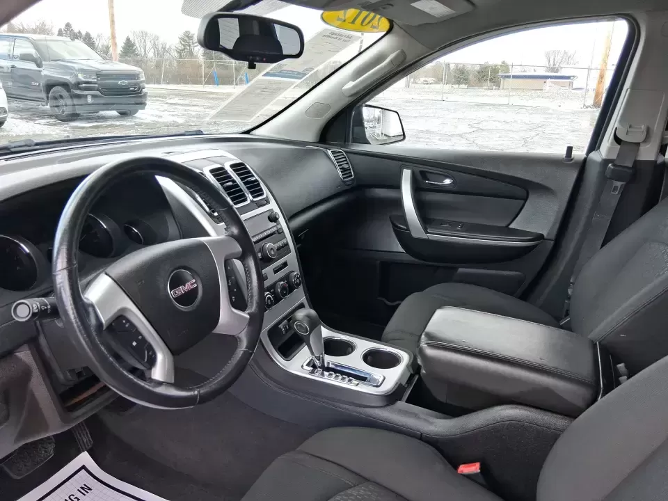 2012 GMC Acadia SL (1GKKRNED6CJ) with an 3.6L V-6 gasoline direct injection engine, 6-Speed Automatic transmission, located at 8750 N County Rd 25A, Piqua, OH, 45356, (937) 908-9800, 40.164391, -84.232513 - Pack up the kids, load the cooler, and point the SUV toward your next weekend getaway-this 2012 GMC Acadia SL is built for real-life Ohio driving, from school drop-offs and long commutes to road trips up I-75 and errands around Piqua. With three-row versatility, confident road manners, and family-fr - Photo#9