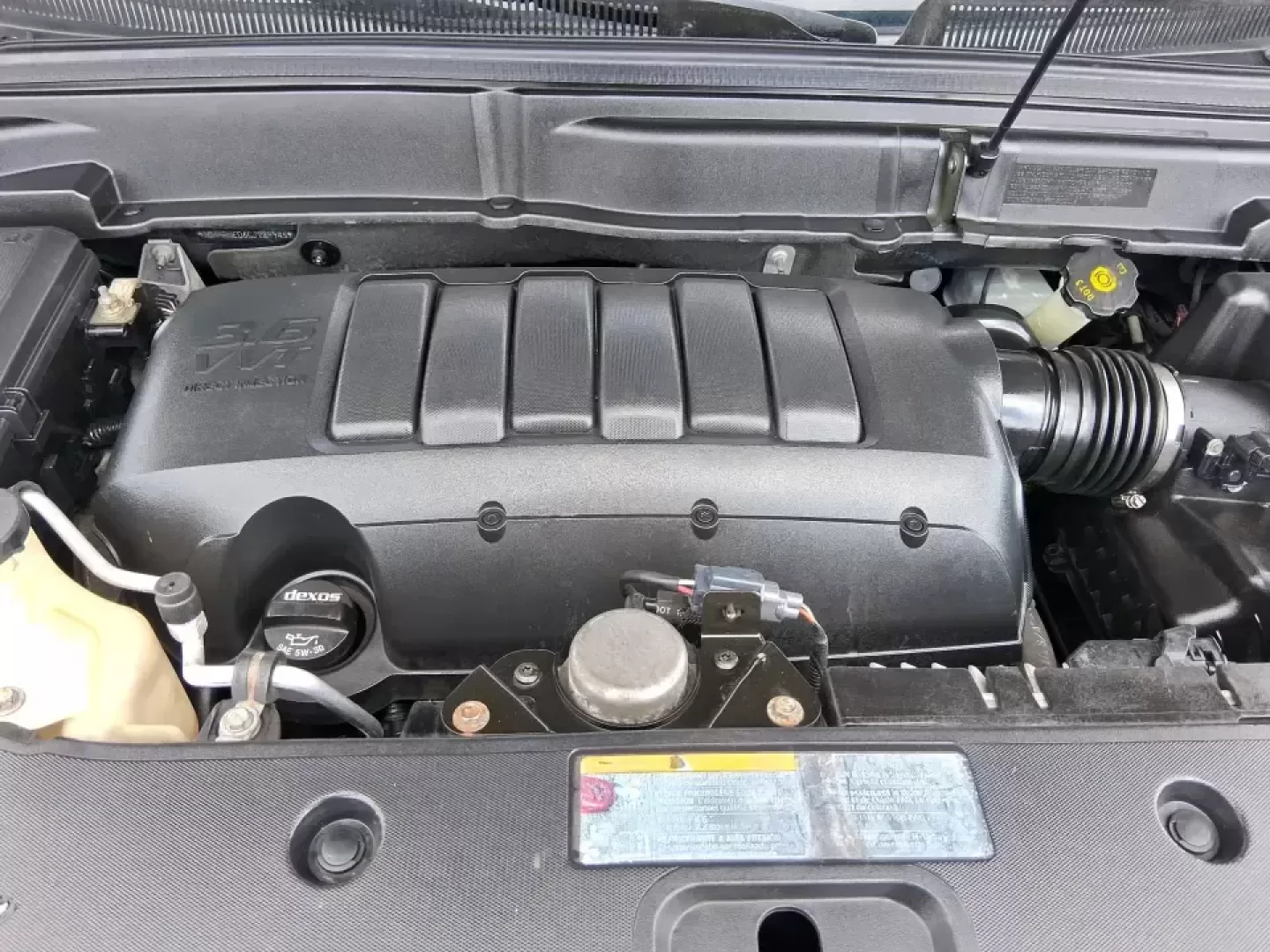 2012 GMC Acadia SL (1GKKRNED6CJ) with an 3.6L V-6 gasoline direct injection engine, 6-Speed Automatic transmission, located at 8750 N County Rd 25A, Piqua, OH, 45356, (937) 908-9800, 40.164391, -84.232513 - Pack up the kids, load the cooler, and point the SUV toward your next weekend getaway-this 2012 GMC Acadia SL is built for real-life Ohio driving, from school drop-offs and long commutes to road trips up I-75 and errands around Piqua. With three-row versatility, confident road manners, and family-fr - Photo#11