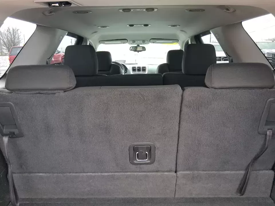 2012 GMC Acadia SL (1GKKRNED6CJ) with an 3.6L V-6 gasoline direct injection engine, 6-Speed Automatic transmission, located at 8750 N County Rd 25A, Piqua, OH, 45356, (937) 908-9800, 40.164391, -84.232513 - Pack up the kids, load the cooler, and point the SUV toward your next weekend getaway-this 2012 GMC Acadia SL is built for real-life Ohio driving, from school drop-offs and long commutes to road trips up I-75 and errands around Piqua. With three-row versatility, confident road manners, and family-fr - Photo#12