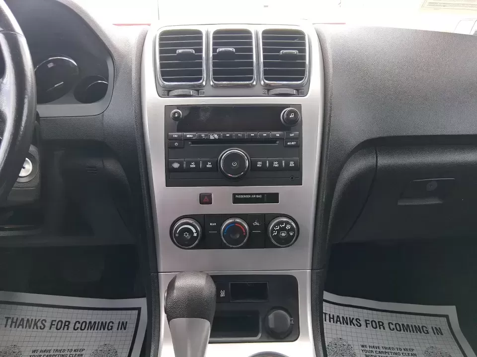 2012 GMC Acadia SL (1GKKRNED6CJ) with an 3.6L V-6 gasoline direct injection engine, 6-Speed Automatic transmission, located at 8750 N County Rd 25A, Piqua, OH, 45356, (937) 908-9800, 40.164391, -84.232513 - Pack up the kids, load the cooler, and point the SUV toward your next weekend getaway-this 2012 GMC Acadia SL is built for real-life Ohio driving, from school drop-offs and long commutes to road trips up I-75 and errands around Piqua. With three-row versatility, confident road manners, and family-fr - Photo#13