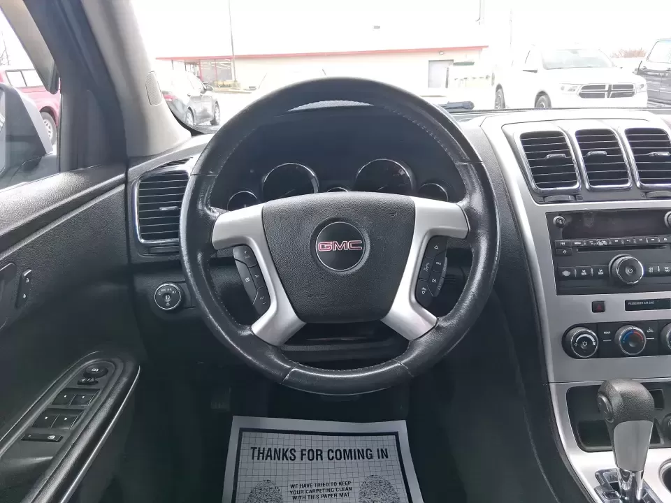 2012 GMC Acadia SL (1GKKRNED6CJ) with an 3.6L V-6 gasoline direct injection engine, 6-Speed Automatic transmission, located at 8750 N County Rd 25A, Piqua, OH, 45356, (937) 908-9800, 40.164391, -84.232513 - Pack up the kids, load the cooler, and point the SUV toward your next weekend getaway-this 2012 GMC Acadia SL is built for real-life Ohio driving, from school drop-offs and long commutes to road trips up I-75 and errands around Piqua. With three-row versatility, confident road manners, and family-fr - Photo#16
