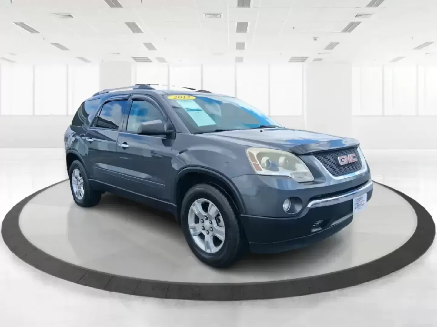 2012 GMC Acadia SL (1GKKRNED6CJ) with an 3.6L V-6 gasoline direct injection engine, 6-Speed Automatic transmission, located at 8750 N County Rd 25A, Piqua, OH, 45356, (937) 908-9800, 40.164391, -84.232513 - Pack up the kids, load the cooler, and point the SUV toward your next weekend getaway-this 2012 GMC Acadia SL is built for real-life Ohio driving, from school drop-offs and long commutes to road trips up I-75 and errands around Piqua. With three-row versatility, confident road manners, and family-fr - Photo#0