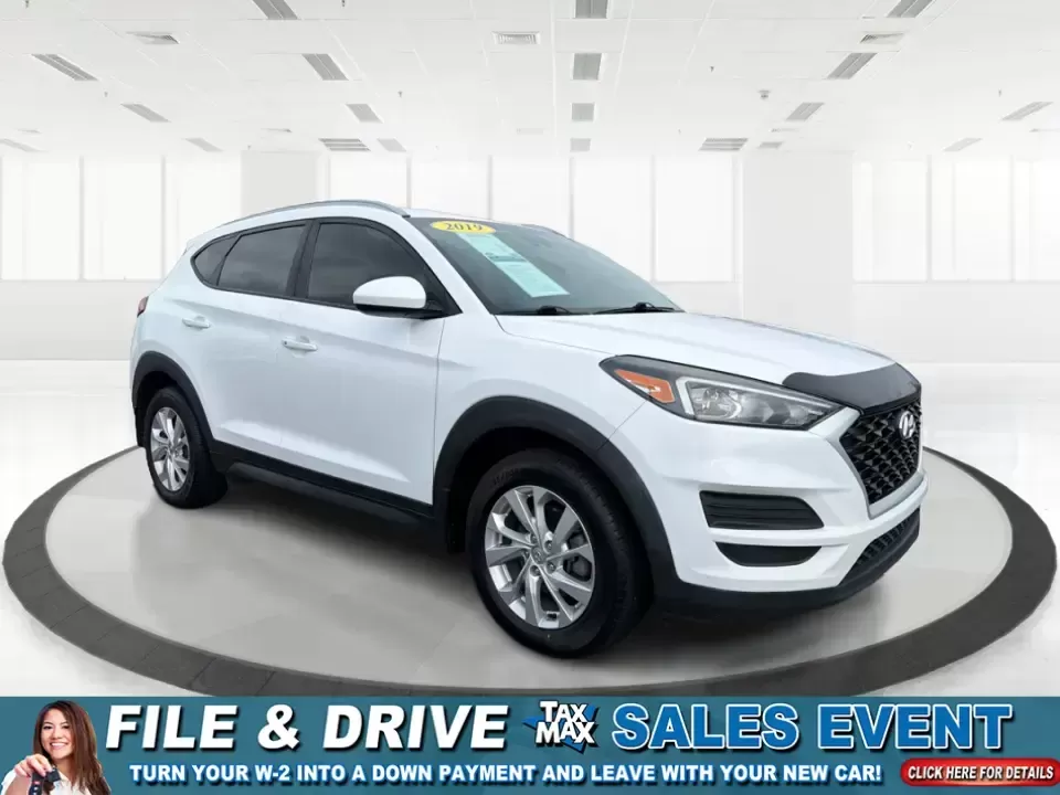 2019 Hyundai Tucson Value (KM8J33A41KU) with an Nu 2L I-4 gasoline direct injection engine, 6A transmission, located at 8750 N County Rd 25A, Piqua, OH, 45356, (937) 908-9800, 40.164391, -84.232513 - Picture your next Ohio weekend: loading up the cooler, tossing sports gear in the back, and cruising from Piqua to a family cookout or a quick getaway-without stressing about space, comfort, or the road ahead. This **2019 Hyundai Tucson Value** in **White Pearl** is the kind of compact SUV that fits - Photo#0