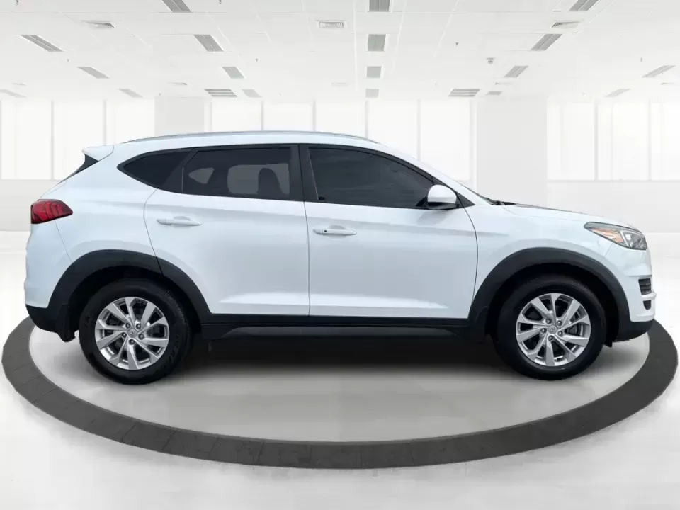 2019 Hyundai Tucson Value (KM8J33A41KU) with an Nu 2L I-4 gasoline direct injection engine, 6A transmission, located at 8750 N County Rd 25A, Piqua, OH, 45356, (937) 908-9800, 40.164391, -84.232513 - Picture your next Ohio weekend: loading up the cooler, tossing sports gear in the back, and cruising from Piqua to a family cookout or a quick getaway-without stressing about space, comfort, or the road ahead. This **2019 Hyundai Tucson Value** in **White Pearl** is the kind of compact SUV that fits - Photo#1