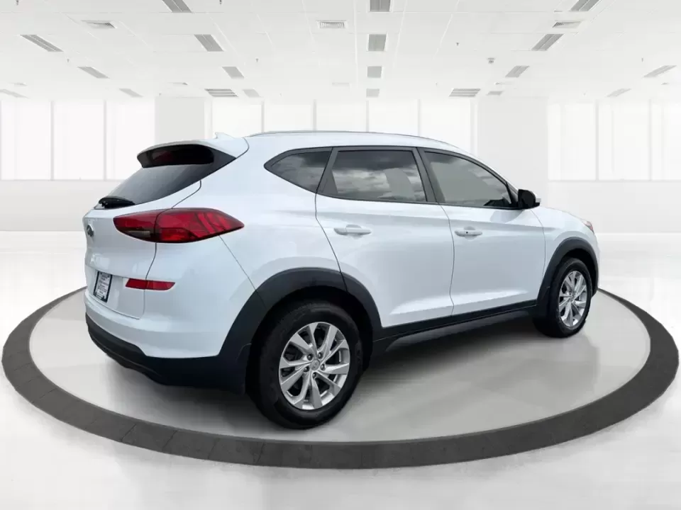 2019 Hyundai Tucson Value (KM8J33A41KU) with an Nu 2L I-4 gasoline direct injection engine, 6A transmission, located at 8750 N County Rd 25A, Piqua, OH, 45356, (937) 908-9800, 40.164391, -84.232513 - Picture your next Ohio weekend: loading up the cooler, tossing sports gear in the back, and cruising from Piqua to a family cookout or a quick getaway-without stressing about space, comfort, or the road ahead. This **2019 Hyundai Tucson Value** in **White Pearl** is the kind of compact SUV that fits - Photo#2