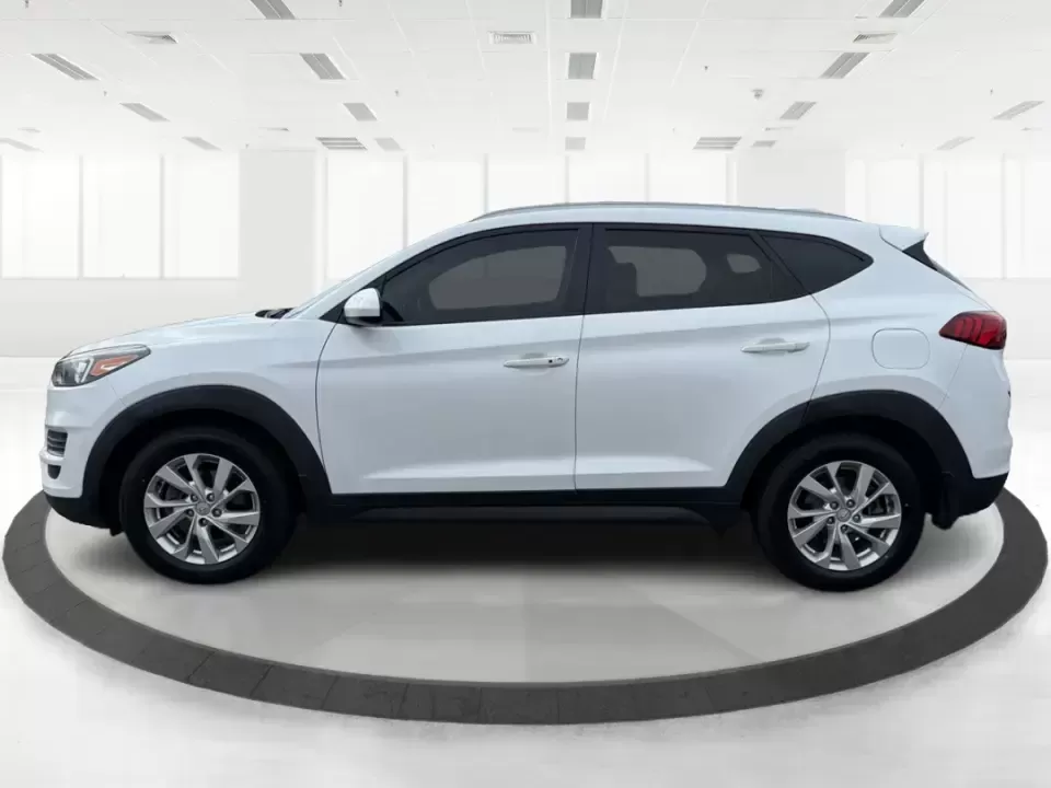 2019 Hyundai Tucson Value (KM8J33A41KU) with an Nu 2L I-4 gasoline direct injection engine, 6A transmission, located at 8750 N County Rd 25A, Piqua, OH, 45356, (937) 908-9800, 40.164391, -84.232513 - Picture your next Ohio weekend: loading up the cooler, tossing sports gear in the back, and cruising from Piqua to a family cookout or a quick getaway-without stressing about space, comfort, or the road ahead. This **2019 Hyundai Tucson Value** in **White Pearl** is the kind of compact SUV that fits - Photo#5