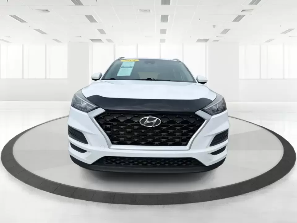 2019 Hyundai Tucson Value (KM8J33A41KU) with an Nu 2L I-4 gasoline direct injection engine, 6A transmission, located at 8750 N County Rd 25A, Piqua, OH, 45356, (937) 908-9800, 40.164391, -84.232513 - Picture your next Ohio weekend: loading up the cooler, tossing sports gear in the back, and cruising from Piqua to a family cookout or a quick getaway-without stressing about space, comfort, or the road ahead. This **2019 Hyundai Tucson Value** in **White Pearl** is the kind of compact SUV that fits - Photo#7