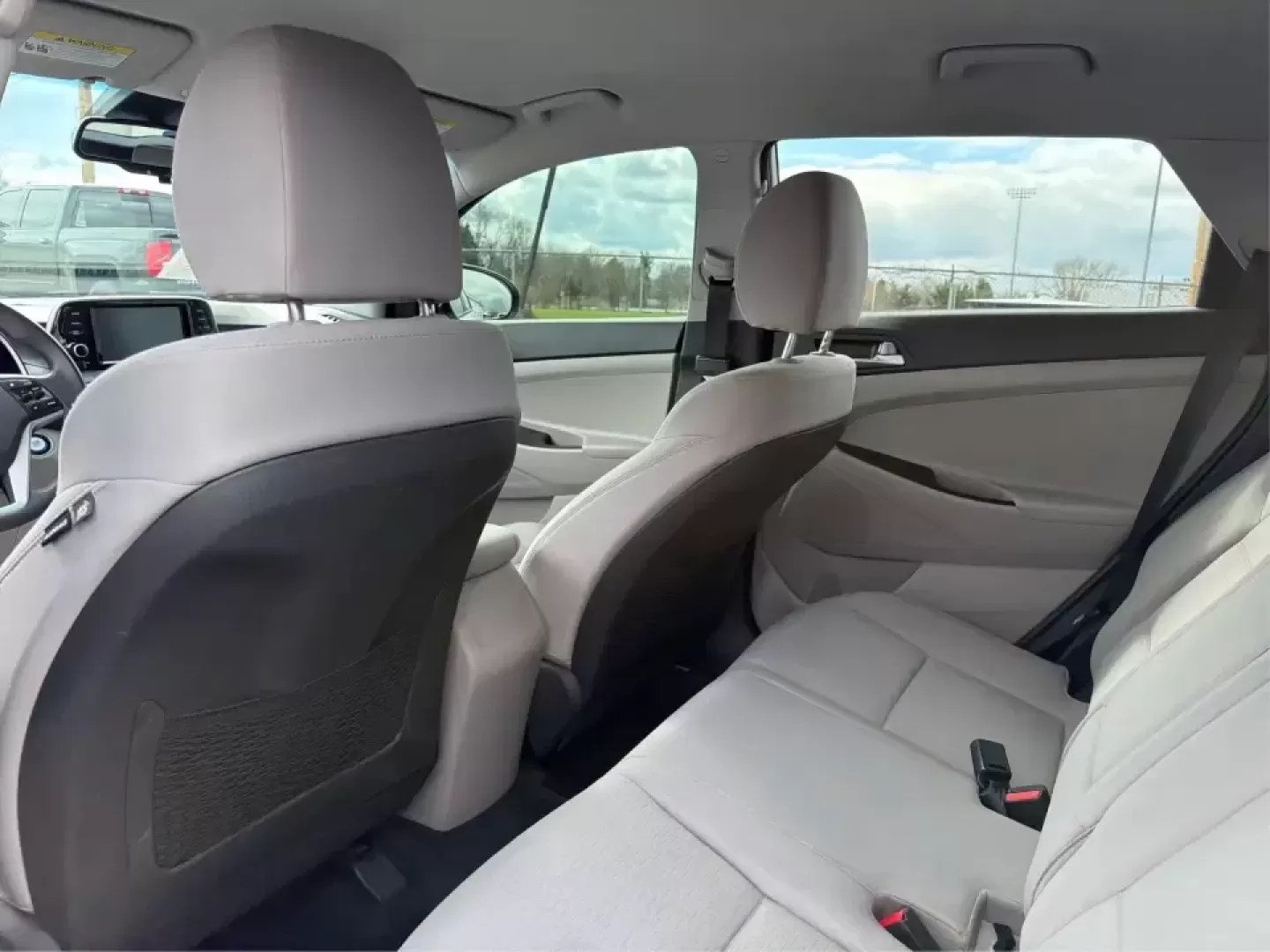 2019 Hyundai Tucson Value (KM8J33A41KU) with an Nu 2L I-4 gasoline direct injection engine, 6A transmission, located at 8750 N County Rd 25A, Piqua, OH, 45356, (937) 908-9800, 40.164391, -84.232513 - Picture your next Ohio weekend: loading up the cooler, tossing sports gear in the back, and cruising from Piqua to a family cookout or a quick getaway-without stressing about space, comfort, or the road ahead. This **2019 Hyundai Tucson Value** in **White Pearl** is the kind of compact SUV that fits - Photo#10