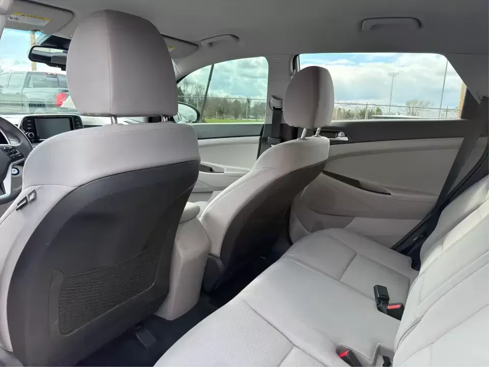 2019 Hyundai Tucson Value (KM8J33A41KU) with an Nu 2L I-4 gasoline direct injection engine, 6A transmission, located at 8750 N County Rd 25A, Piqua, OH, 45356, (937) 908-9800, 40.164391, -84.232513 - Picture your next Ohio weekend: loading up the cooler, tossing sports gear in the back, and cruising from Piqua to a family cookout or a quick getaway-without stressing about space, comfort, or the road ahead. This **2019 Hyundai Tucson Value** in **White Pearl** is the kind of compact SUV that fits - Photo#10