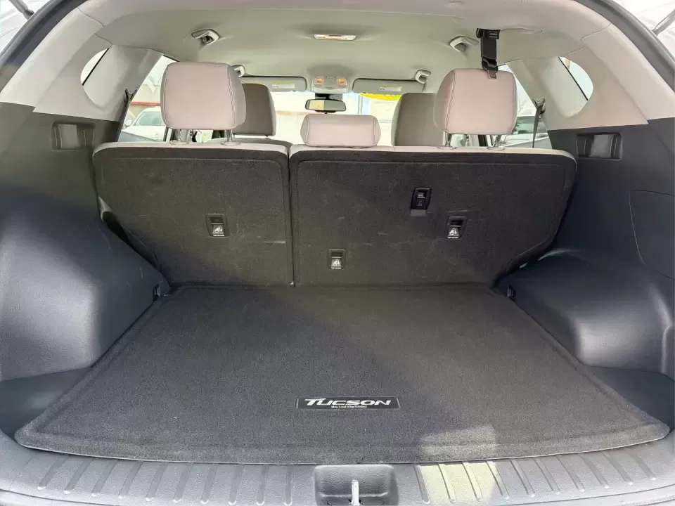 2019 Hyundai Tucson Value (KM8J33A41KU) with an Nu 2L I-4 gasoline direct injection engine, 6A transmission, located at 8750 N County Rd 25A, Piqua, OH, 45356, (937) 908-9800, 40.164391, -84.232513 - Picture your next Ohio weekend: loading up the cooler, tossing sports gear in the back, and cruising from Piqua to a family cookout or a quick getaway-without stressing about space, comfort, or the road ahead. This **2019 Hyundai Tucson Value** in **White Pearl** is the kind of compact SUV that fits - Photo#12